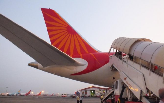 Air India flight makes emergency landing at Mumbai airport after engine emits smoke