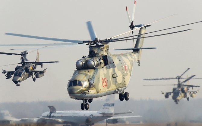 Russian helicopters deliver air strikes against simulated saboteurs in Arctic drills